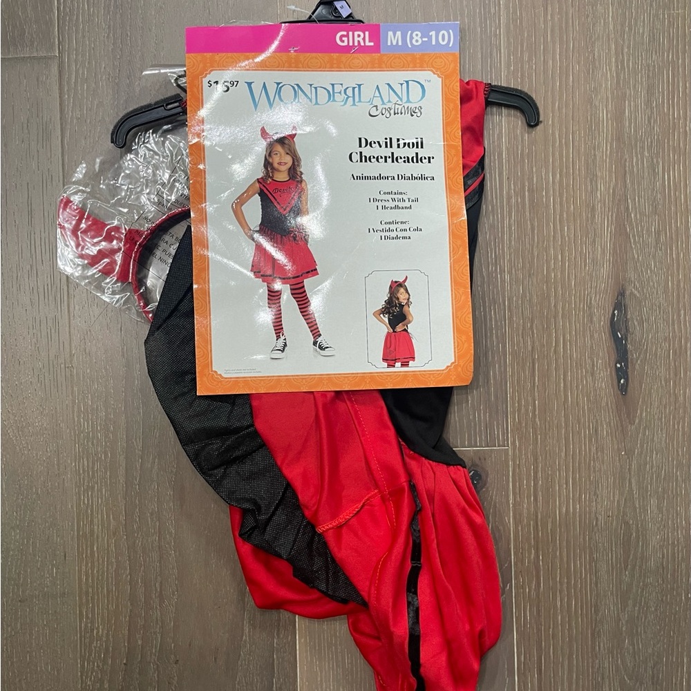Wonderland child costume. NWT. Med 8-10 dress w/tail and headband